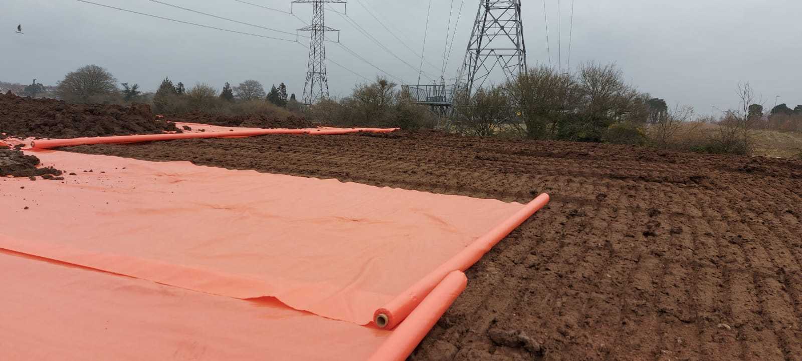 Capping contaminated ground